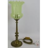 A brass Edwardian style table lamp with green vaseline glass shade. Overall height 47cm. Condition