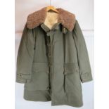 A vintage Swedish army WW2 pattern M1909 coat, Mats Larsson sheepskin lined, canvas outer, horn