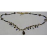 A delicate vermeil fringe necklace set with various semi-precious stones & pearls, including