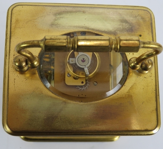 A 19th century gilt brass cased carriage clock with engraved gilt mask and enamelled dial ting. - Image 6 of 8