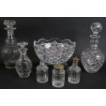 Two 19th century cut glass decanters, a 20th century decanter, three cut glass cruet bottles and a