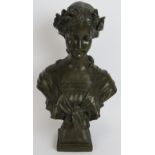 A contemporary Art Nouveau style bronze bust of a young girl in period dress. Height 46cm. Unsigned.