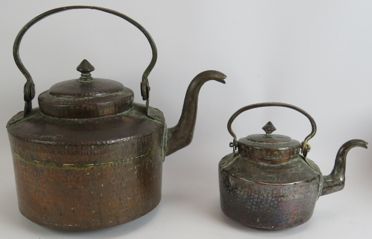 Two beaten copper Omani kettles, largest 36cm tall and a similar beaten copper cooking pot, 32cm - Image 2 of 3