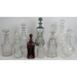 A collection of mainly antique decanters including a pair of 19th century decanters, a Regency