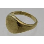 A gentleman's 9ct gold signet ring, size S, approx weight 8.7 grams. Condition report: Some