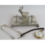 A late 19th century silver plated inkstand with stag mount, a gold plated pocket watch with