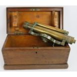 A 19th century brass theodolite in fitted oak case. Engraved "Stanley, Gt Turnstile, Holborn,