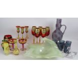 A mixed lot of highly decorated glassware including wine glasses, coupes, lemonade set, vases and