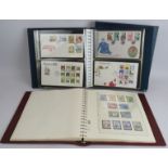 An album of Jersey postage stamps, 1969-1984 and an album of Jersey First Day covers, 1973-1994. (