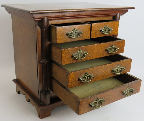 A small set of antique oak drawers/collectors cabinet. Possibly an apprentice piece. Height 38cm. - Image 3 of 3