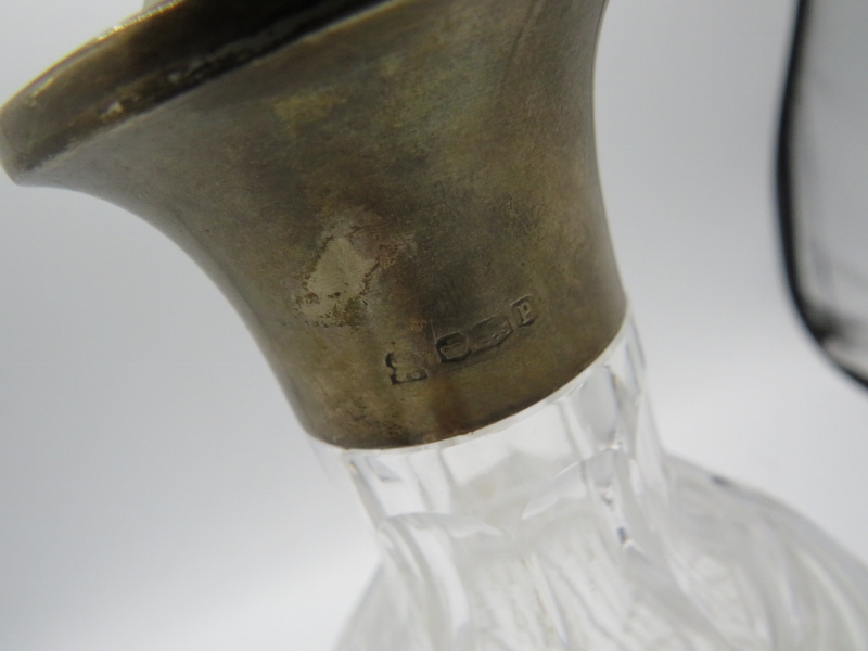 A finely engraved glass liqueur bottle with silver mounts. Import marks for London 1895 with - Image 2 of 4