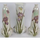 An early 20th century pearl lustre vase by Gebruder Heubach hand decorated with irises and two