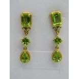 Peridot earrings, post back, faceted octagon, round & pear cut stones of good cut, colour and