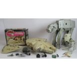 A collection of vintage Star Wars toys including a boxed Palitoy Snow Speeder, a Kenner Products