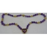 A fine quality Torbjorn Tillander frosted amethyst & citrine necklace with 18ct yellow gold shield