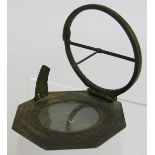 An 18th century gilt brass pocket compass sundial engraved "Eleva Po'll Augsburg Paris 48 Cracau