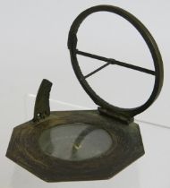 An 18th century gilt brass pocket compass sundial engraved "Eleva Po'll Augsburg Paris 48 Cracau