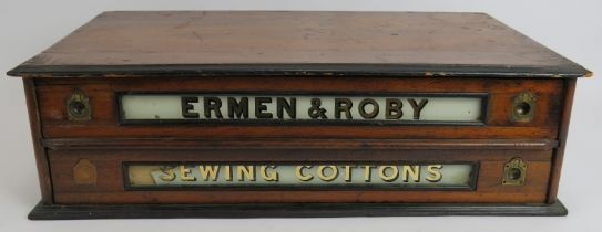 A set of 19th century mahogany Ermen & Roby cotton reel shop display drawers with gilt glass