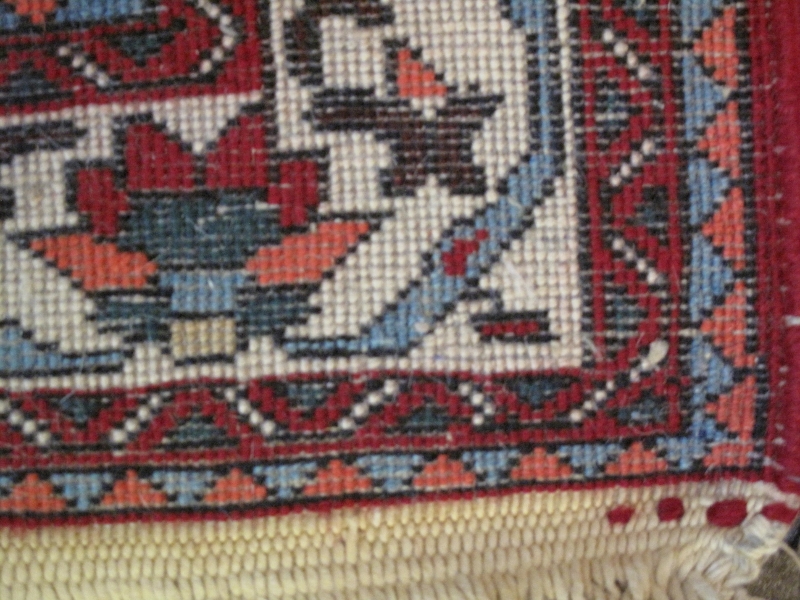 A Persian rug, 20th century, decorated with a central lozenge medallion amidst stylised motifs and - Image 5 of 5