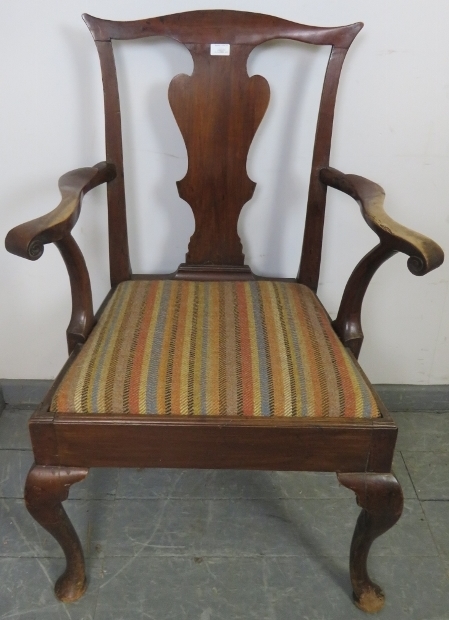 A Georgian mahogany open-sided carver chair, with shaped back splat and scrolled arms, the seat