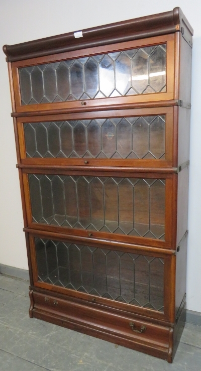 A vintage mahogany Globe-Wernicke stacking bookcase of four graduated sections, the glazed doors - Image 2 of 3