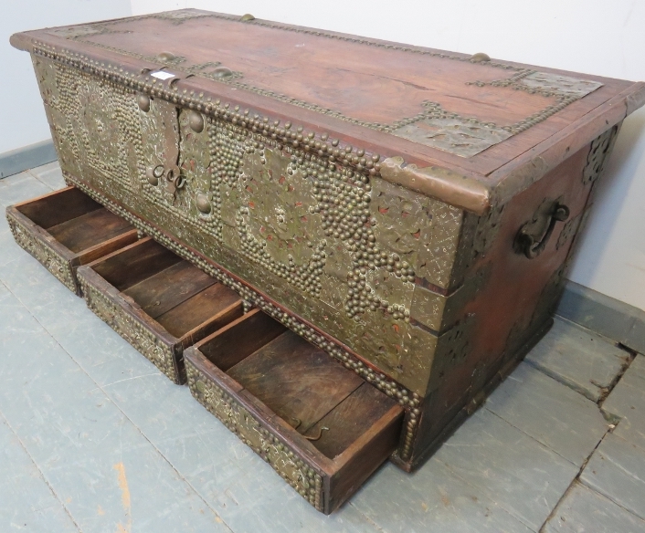 A 19th century hardwood Zanzibar chest, featuring pierced brass decoration and a multitude of - Image 4 of 4