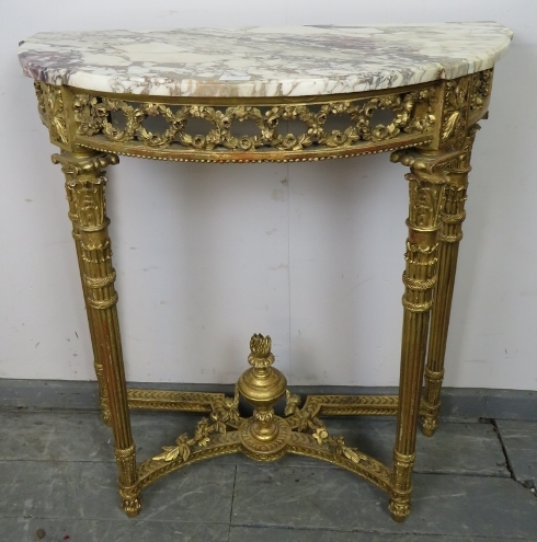 A 19th century Louis XV Revival giltwood marble topped demi-lune console table, with carved and