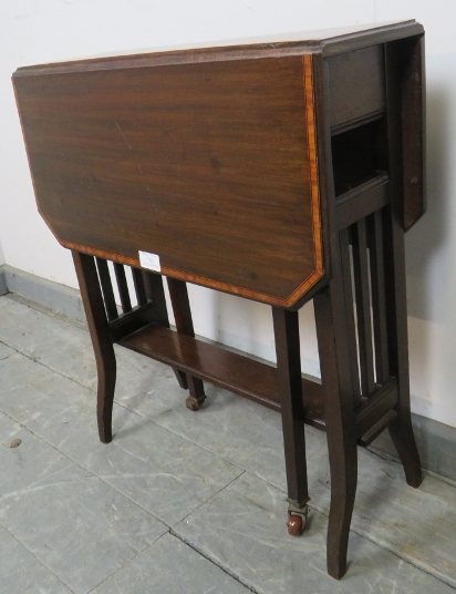 An Edwardian mahogany Sutherland table, with crossbanded inlay, on square supports with ceramic - Image 4 of 4