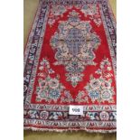 Central Persian Qum rug. Pastel shades of floral, pattern on red ground. Good condition. 170cm x