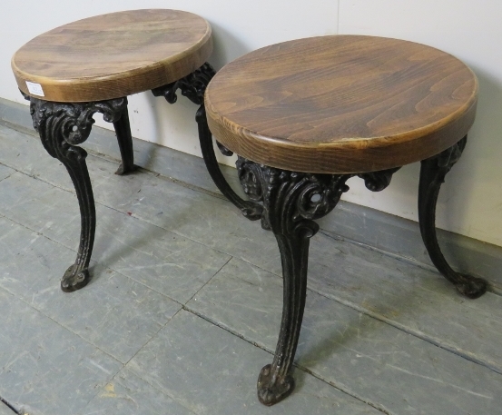 A pair of small medium oak stools, on splayed cast iron supports with acanthus leaf decoration. - Image 2 of 2