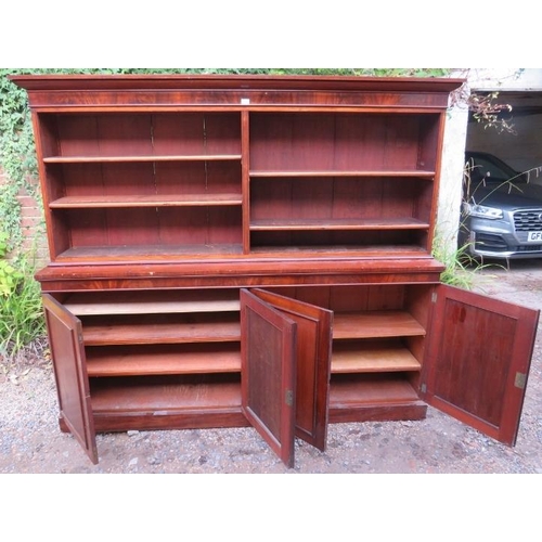 A very large Victorian mahogany bookcase, of four height adjustable open shelves above four cupboard - Image 2 of 3