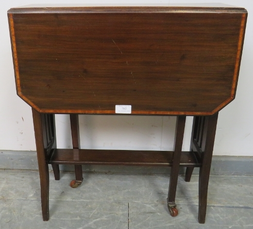 An Edwardian mahogany Sutherland table, with crossbanded inlay, on square supports with ceramic - Image 3 of 4