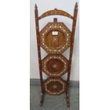 An antique hardwood Hoshiapur three tier folding cake stand, featuring bone inlay in the Moorish