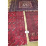 Three Persian small rugs, early-mid 20th century. 130cm x 85cm approx. Please see images for