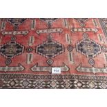 South West Persian Lori carpet. All over repeat pattern on pale red ground. Good even wear and