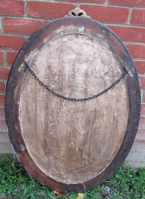 A 19th century oval wall mirror in an ornate gilt gesso frame featuring polychrome decoration in the - Image 4 of 4