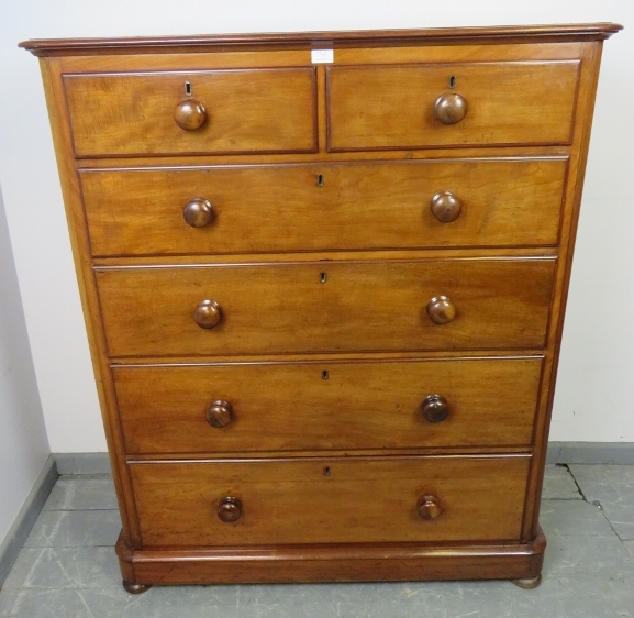 A Victorian mahogany straight front chest of two short over four long graduated drawers with