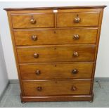 A Victorian mahogany straight front chest of two short over four long graduated drawers with