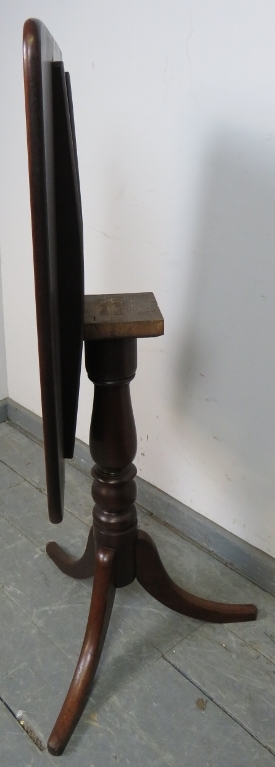 A Victorian mahogany rectangular tilt-top wine table, on a baluster turned column with splayed - Image 2 of 4