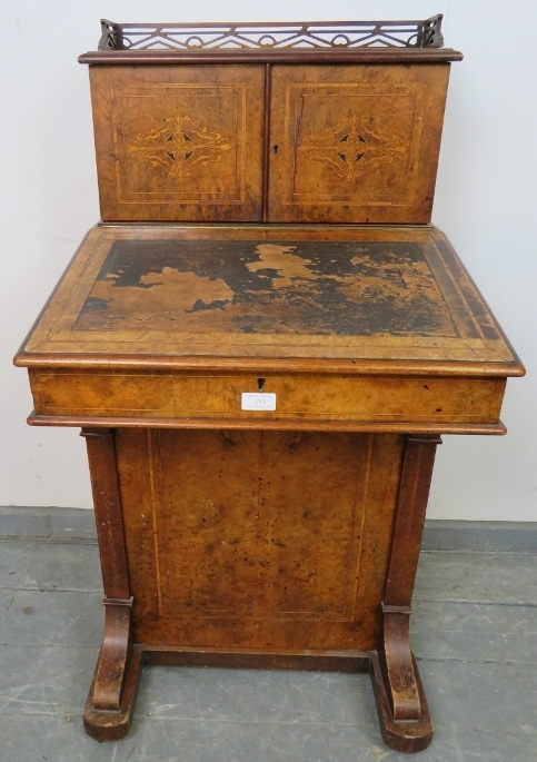 A Victorian burr walnut Davenport, the stationary compartment upper gallery featuring marquetry
