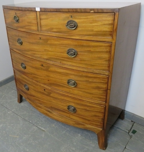 A George III mahogany bow-fronted chest of two short over three long graduated cock-beaded drawers - Image 2 of 3