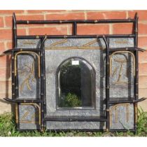 An aesthetic period ebonised bamboo wall hanging shelf, with central arched and bevelled mirror.