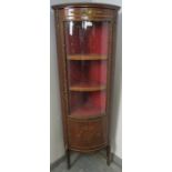 A vintage French Louis XV style kingwood corner vitrine with white marble top and ormolu mounts in
