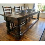 An Elizabethan and later oak refectory table of exceptional colour and patina, the planked top