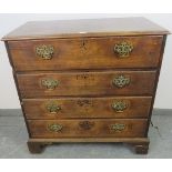 A Georgian mahogany secretaire chest, the secretaire section with fall front opening onto a fitted