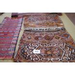 A large late 19th-early 20th century Persian saddle bag (very nice), a small Persian rug and a