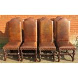 Eight antique style high back dining chairs, upholstered in distressed brown leather with large