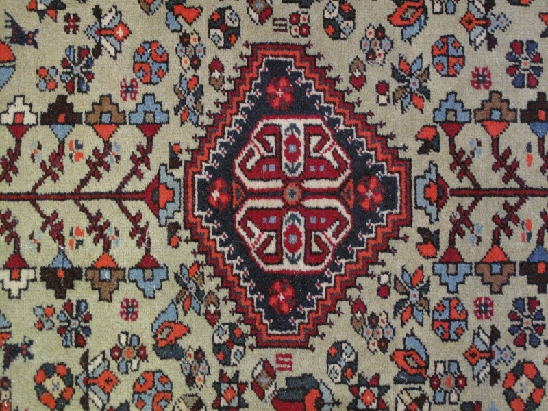 A Persian rug, 20th century, decorated with a central lozenge medallion amidst stylised motifs and - Image 2 of 5