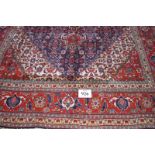 A fine Persian Tabriz carpet, blue, red, cream in excellent condition and good colour. 311cm x