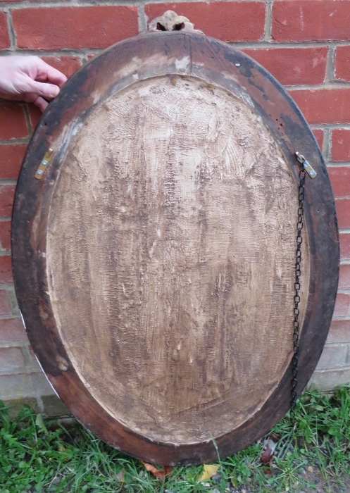 A 19th century oval wall mirror in an ornate gilt gesso frame featuring polychrome decoration in the - Image 3 of 4